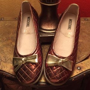 Moschino bronze quilted leatherflats with gold bow